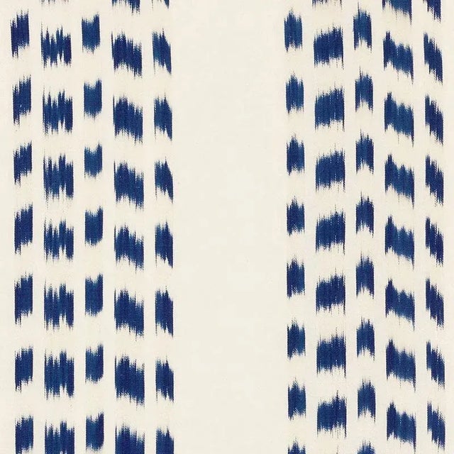 Using a traditional, artisanal weaving technique, this Ikat is intentionally irregular, emphasizing the art of the hand....