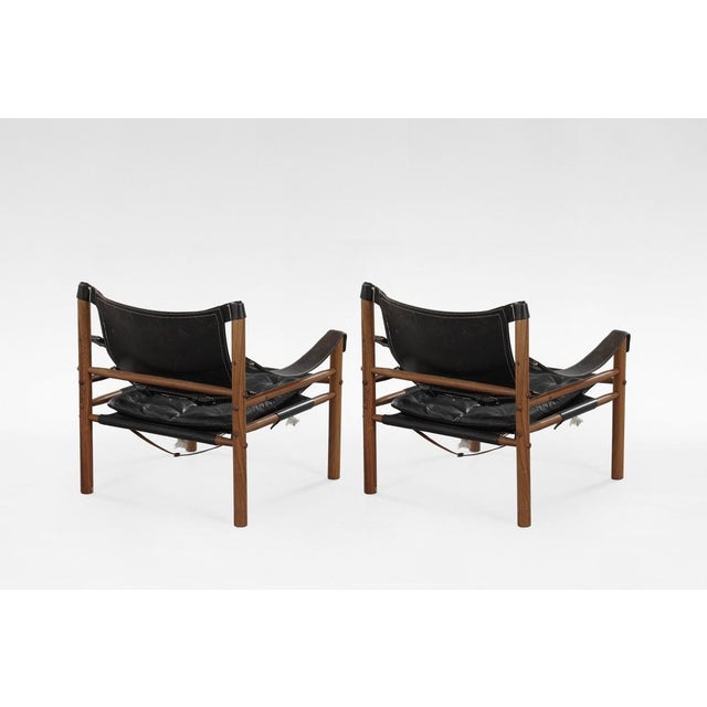 A rare pair of sirocco lounge chairs by arne norell, crafted in sweden in the 1960s and produced by norell möbel ab. A...