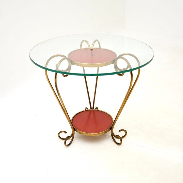 A stylish and extremely well made vintage Italian brass and glass coffee / occasional table. This was recently imported...