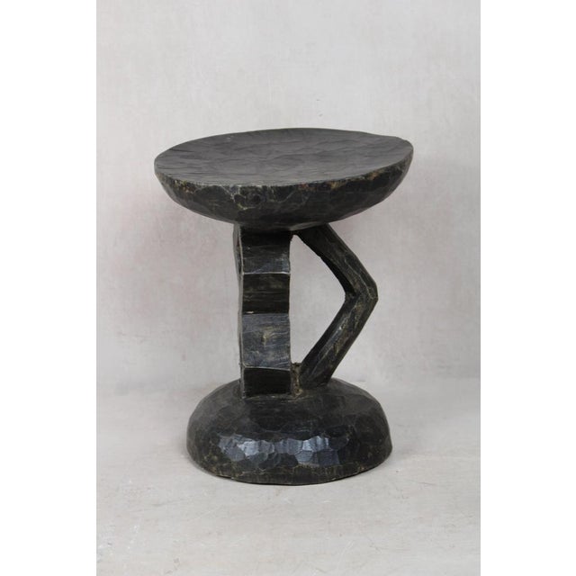 Hand-carved from a single piece of wood, the Tonga stool is a genuine artifact. These stools were status symbols for...