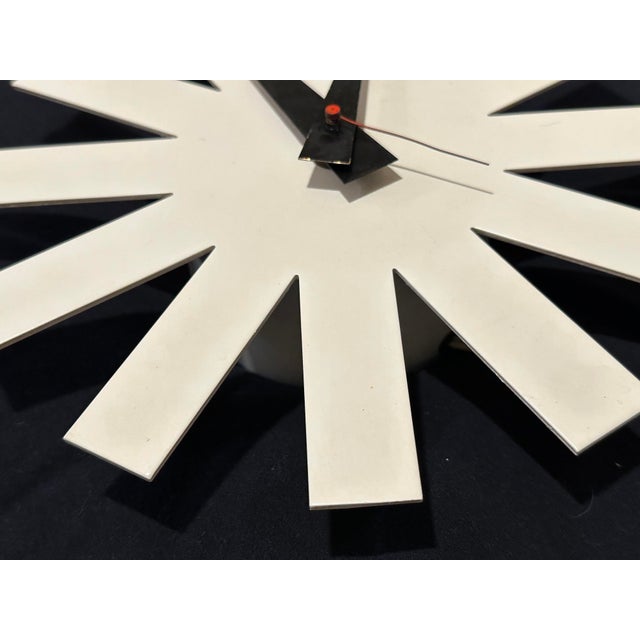 Exceedingly rare original Howard Miller white Asterisk clock with sweeping second hand clock. Most of these clocks have...