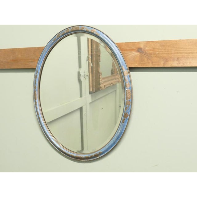 Art Deco Blue Oval Mirror This Mirror has a blue moulded oval frame with an embossed gilt floral decoration The Oval frame...