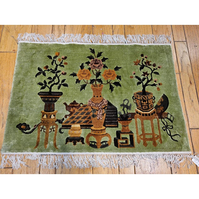 An exquisite pair of Chinese Art Deco pictorial rugs from the second quarter of the 20th century — a rare opportunity to...