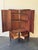 Elegant Mid Century Modern Danish corner cabinet in style of Kai Kristiansen, crafted in warm rosewood with beautifully...