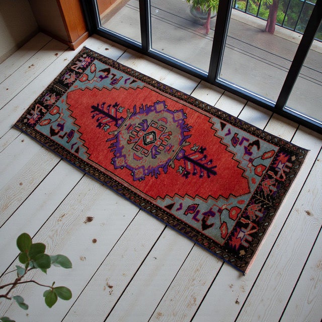 Welcome to our curated collection of authentic Anatolian textiles. This captivating hand-knotted small Oushak rug brings...
