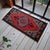 Welcome to our curated collection of authentic Anatolian textiles. This captivating hand-knotted small Oushak rug brings...