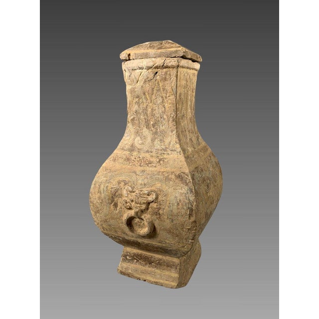 Polychrome terracotta vase, Early Han Dynasty (206 BC - 220 AD). Polychrome painted terracotta with archaic motifs in...