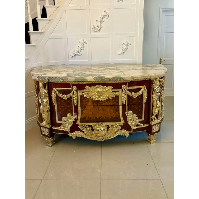 Antique fine french rare pair of early 20th century mahogany, fruitwood marquetry and gilt bronze mounted commodes in the...
