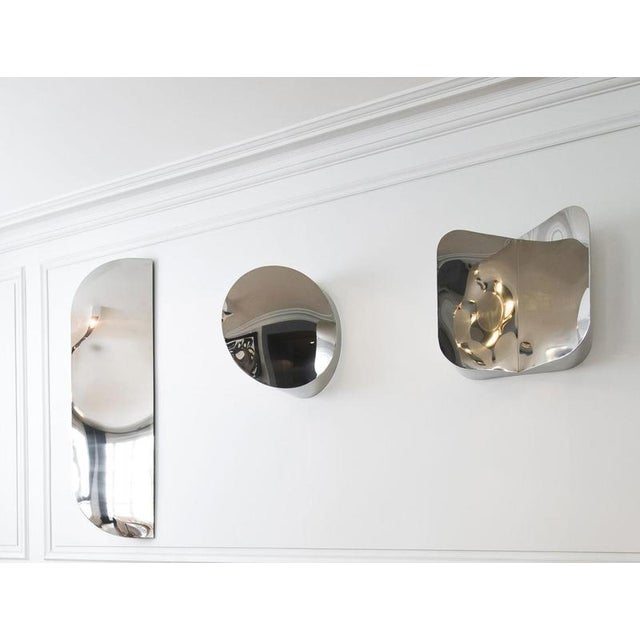 Cutting Space Square Mirror by Haymann Editions Dimensions: D 30 x W 50 x H 50 cm. Materials: Polished stainless steel....