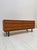 Beautiful vintage chest of drawers from the 1960s with clean Mid-Century Modern lines and elegant walnut veneer. The piece...