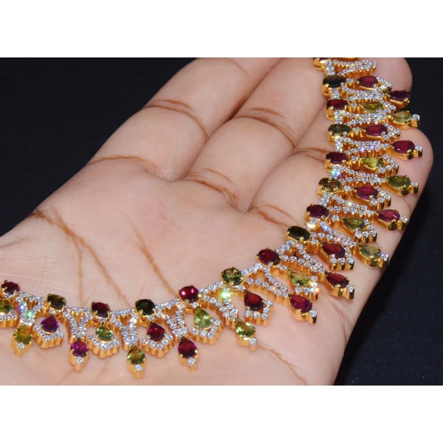 Top quality tourmaline and diamond necklace. This necklace is loaded with 4.53CTS of brilliant cut natural diamonds and...