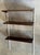 Vintage 1960s Mid-Century Modern wall shelving system in style of Kai Kristiansen, featuring richly grained rosewood...