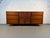 This striking mid-century modern dresser, designed by Merton Gershun for American of Martinsville, is a masterful example...