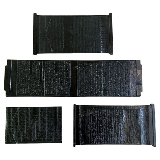 A collection of four carved wood print blocks from Japan circa late 19th century (Meiji Period). Constructed and hand-...