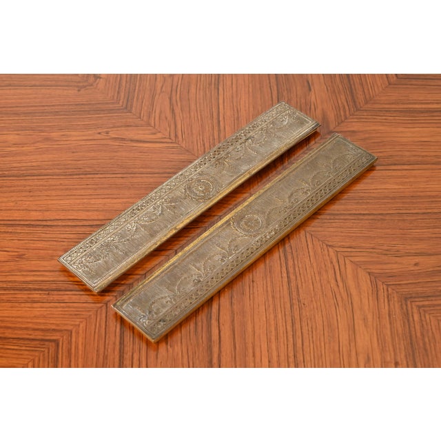 A gorgeous pair of Art Deco period bronze blotter ends featuring Adam style or Neoclassical style swags By Tiffany Studios...