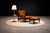 A commanding yet deeply inviting lounge chair and ottoman by Alexandre Rapoport, this set exemplifies the sculptural...
