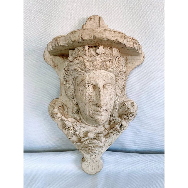 An impressive large outdoor Garden Wall Ornament/ Shelf Bracket with a royal queen's head. Circa Late 20th Century. This...