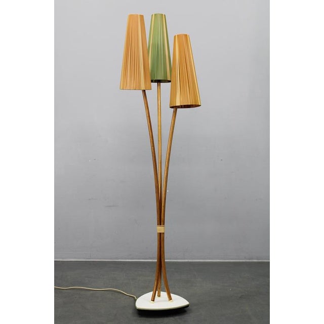 A striking mid-century modern floor lamp produced in east germany during the 1960s by pgh leuchtenbau. This sculptural...
