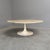 Mid century coffee table from the 1960s with tulip base. Carrara marble table top with steel base. Table is in good...