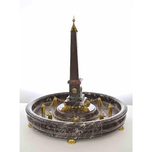 Italian Ormolu-Mounted Obelisk in Various Marbles including porphyr and rosso levanto, with gilded bronze decorations....