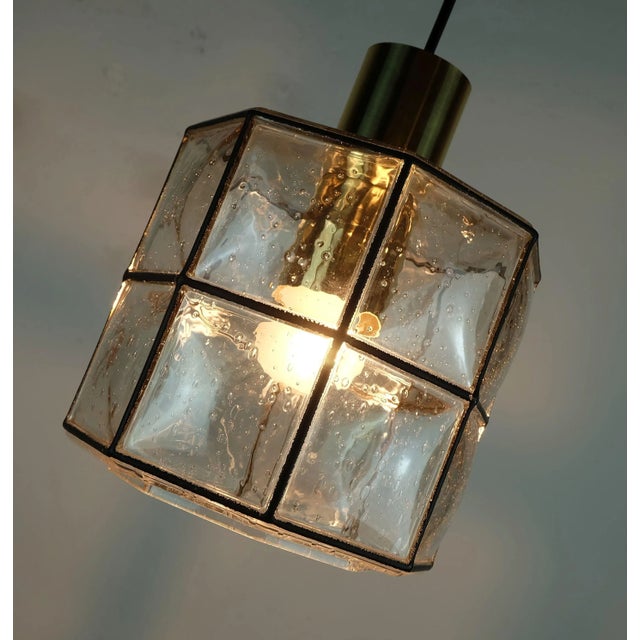 Fantastic vintage pendant light manufactured in the 1960's to 1970's by Glashuette Limburg West-Germany. Clear glass shade...