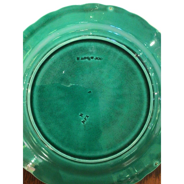 I have a pair of these 19th Century English Wedgewood majolica plates in a sunflower design