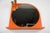 Orange illuminated wall mirror, Germany, 1970s. This bold vintage mirror features a round dark-tinted mirror plate set...