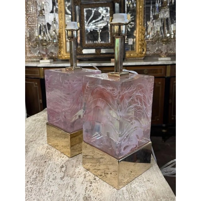 The Pair of Pink Murano Glass and Brass Block Mirrors is a stylish and elegant addition to any home decor. The combination...