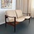 This iconic Scandinavian Modern piece of Norwegian design is the Loveseat Model 771, by Fredrik A. Kayser for Vatne...