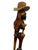 This vintage folk art wood sculpture of a parrot is a unique and handmade piece, measuring 41 inches in height. The...