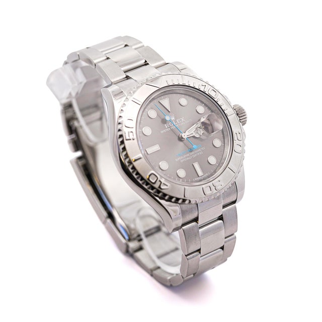 Pre Owned Rolex Yacht-Master 400 rhodium dial with platinum rotating bezel. Complete with all original parts and an...