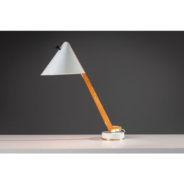 This rare and distinctive b54 table lamp, designed by hans agne jakobsson, is a refined example of scandinavian modernism...