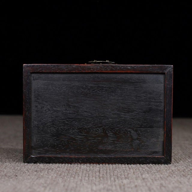 This exquisite vintage jewelry box is a beautiful example of traditional Asian craftsmanship. Crafted from dark, richly...