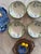 Beautiful set of four vintage bowls by Franciscan in the Forget Me Not pattern, featuring delicate hand-painted blue...