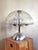 Table lamp in chrome steel and blown Murano glass from the Doria Leuchten brand. Doria Leuchten was a manufacturer of...