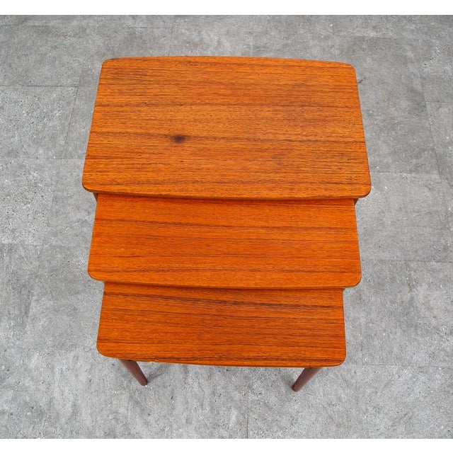 This set of three teak tables were recently refinished and are now available. The tables are made of solid teak and teak...