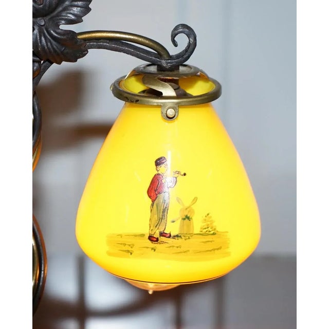 Stunning circa 1930s bronze bird with glass domed shade and wrought iron frame table lamp A very well made piece, with the...