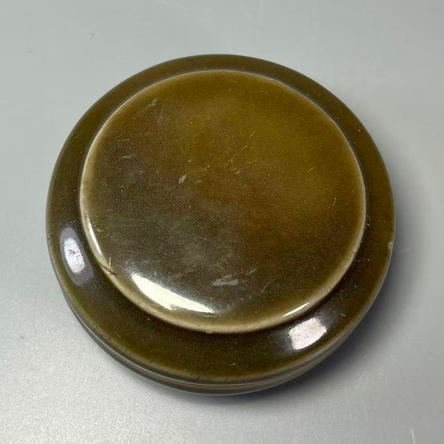 This is a traditional‑style Longquan Celadon powder box, historically used for storing rouge and face powder in ancient...