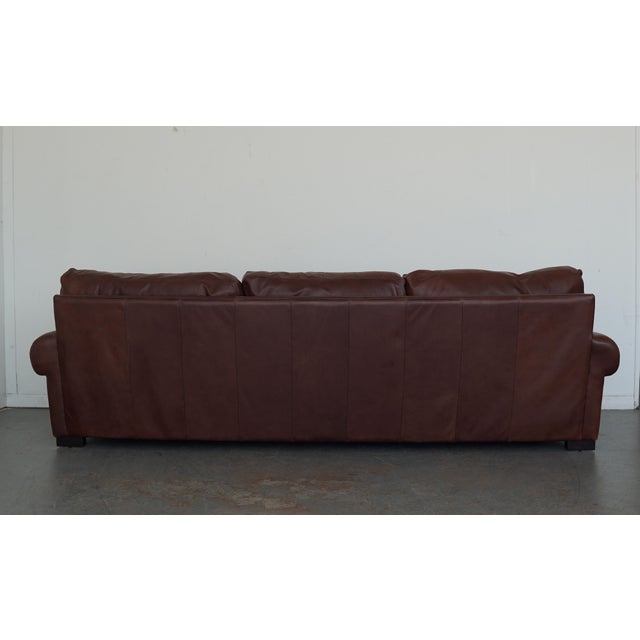 The Turner Roll Arm Leather Sofa by Pottery Barn is a study in relaxed sophistication. Its classic roll arms and generous...