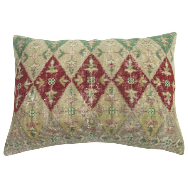 Large pillow made from an antique Indian rug. 2' x 2'9''