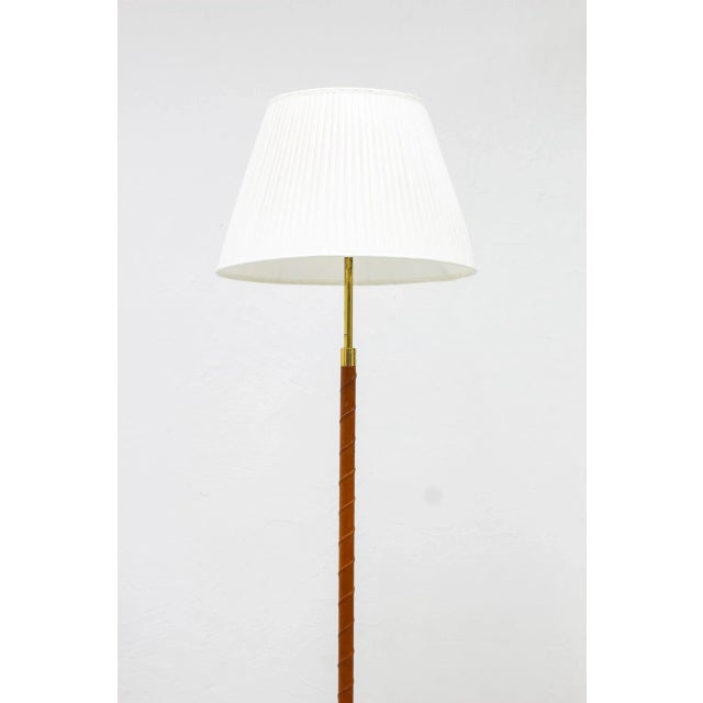 Floor lamp model 32753 produced by Nordiska Kompaniet. Attributed to the head designer for the NK lighting department...