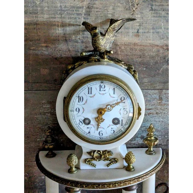 Guilded Bronze and White Marble Fireplace Set, late 19th, beginning of 20th century, Louis XVI style White marble and...