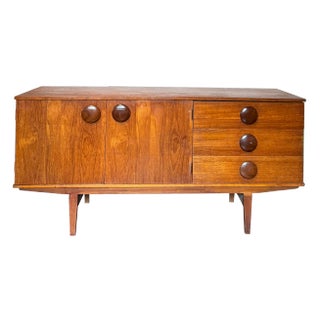 A Mid Century Modern Sideboard With Round Wooden Pulls, Circa 1960s. Maker Is Unknown For Sale