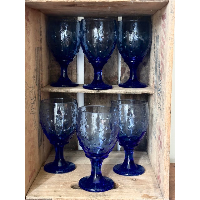 A striking set of 6 OLD MID-CENTURY GOBLETS. Features an ENHANCED, VIBRANT COBALT BLUE colorway. The distinct TEXTURED...