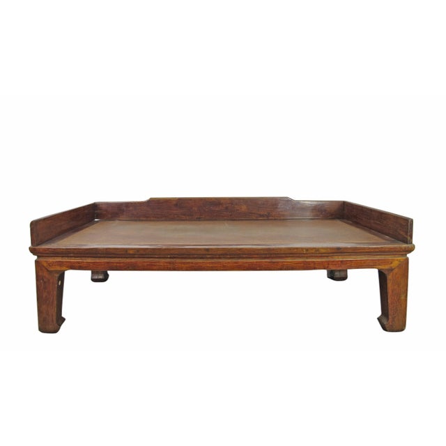 This late 19 century antique Chinese daybed is also known as Luohan bed or Opium bed. The rails and frames are crafted...