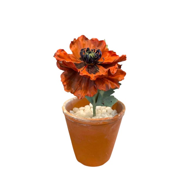 A gorgeous, vintage tole poppy, Features a single stem, hand sculpted, tole metal poppy in red with an attached tole leaf....