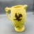 A lovely Delcroft of England handled pottery pitcher . The vintage pitcher features flying birds and flowers with a flower...