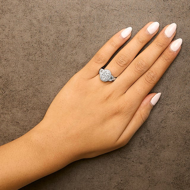 Early 21st Century 10K White Gold 1.0 Cttw Diamond Oval Cluster with Halo Vintage-Inspired Art Deco Buckle Style Statement Ring (G-H Color, SI1-SI2 Clarity) - Size 7.5 For Sale - Image 5 of 6