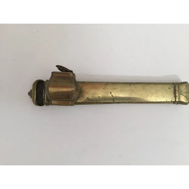 Middle Eastern Moorish brass inkwell Qalamdan. The Qalamdan is in solid brass, engraved with geometric designs. It...