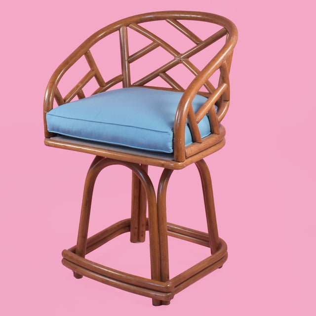 Pair of Rattan Fretwork Low Stools in nice as found VINTAGE condition. There are minor scuffs, scrapes and wear to the...